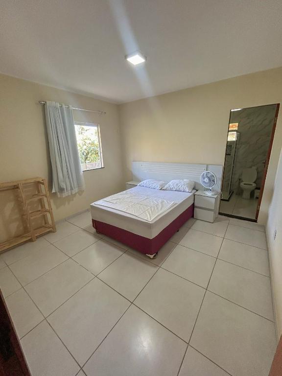 Postel nebo postele na pokoji v ubytování Surf Stop Hostel Serra Grande