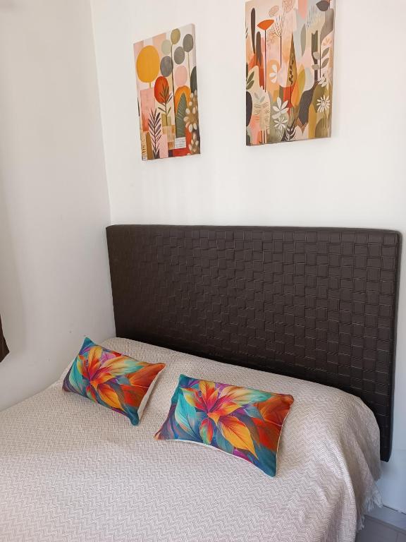 A bed or beds in a room at Estudio a 50mt del mar, zona Palacio de Congresos Apto 7