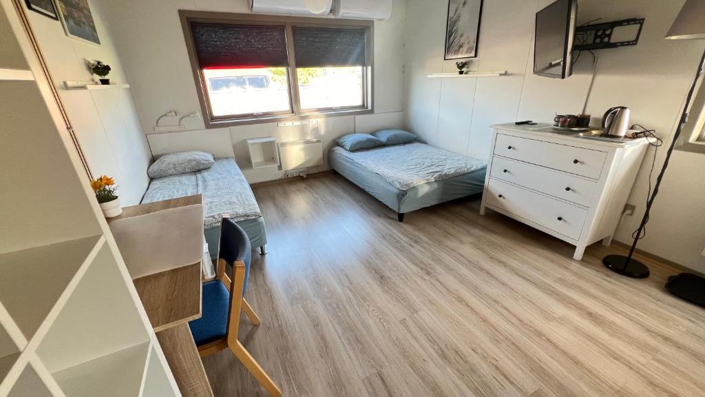 Ένα ή περισσότερα κρεβάτια σε δωμάτιο στο Pavillon Greve