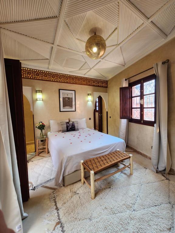 Postel nebo postele na pokoji v ubytování Riad Mumtaz Marrakech