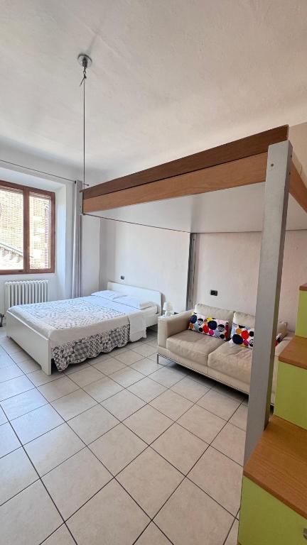 A bed or beds in a room at Sawasdee 37
