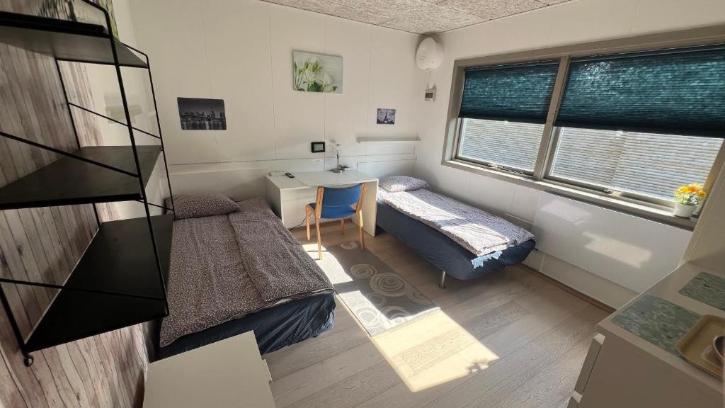 Ένα ή περισσότερα κρεβάτια σε δωμάτιο στο Pavillon Greve