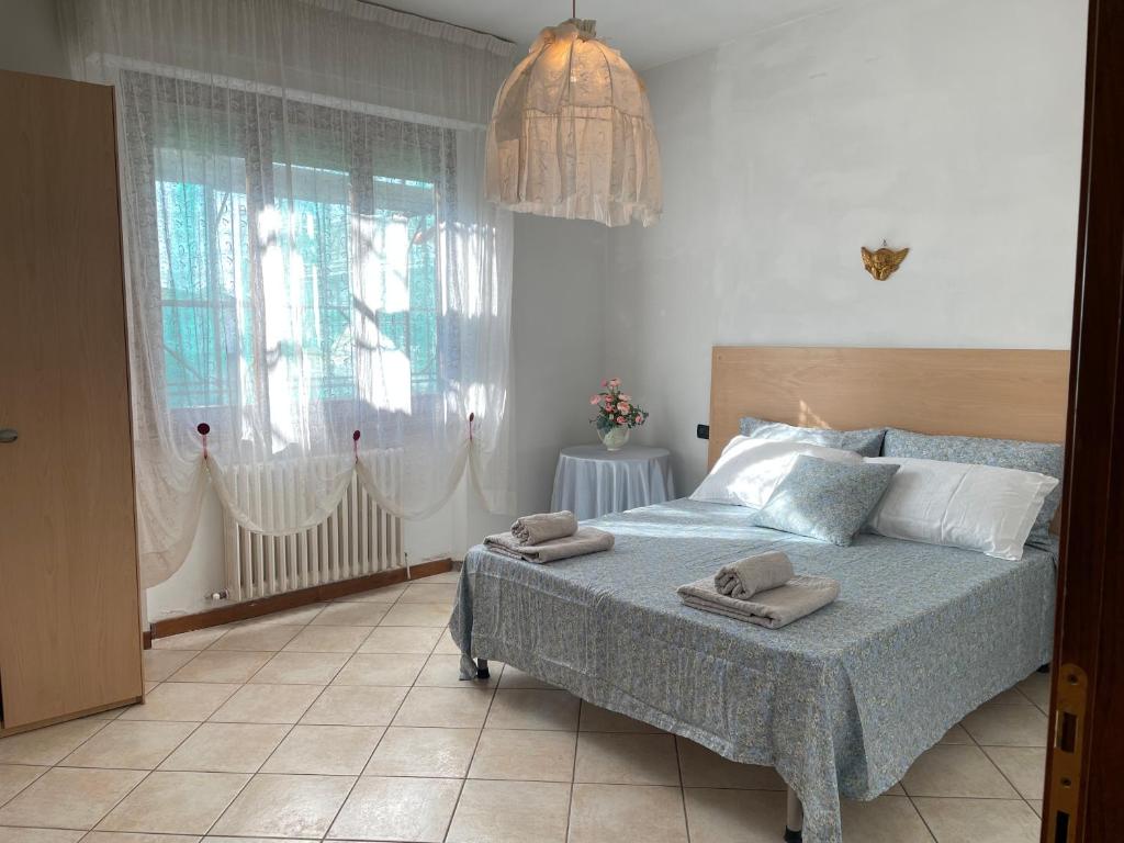 Postel nebo postele na pokoji v ubytování Appartamento Leone Quarrata