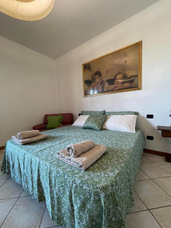 Postel nebo postele na pokoji v ubytování Appartamento Leone Quarrata