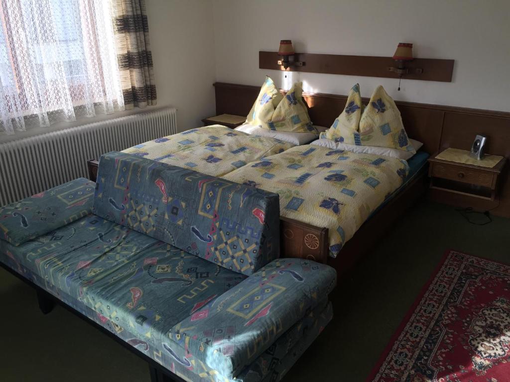 Cama o camas de una habitaci&oacute;n en Landhaus Moises