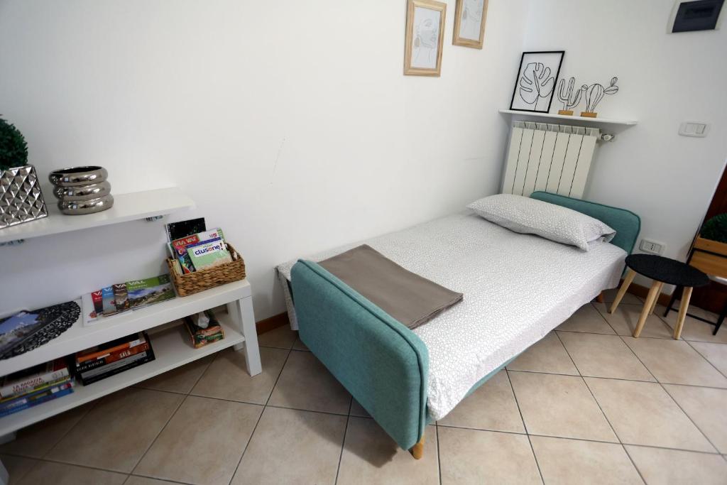 Postel nebo postele na pokoji v ubytování La casetta di Lorena