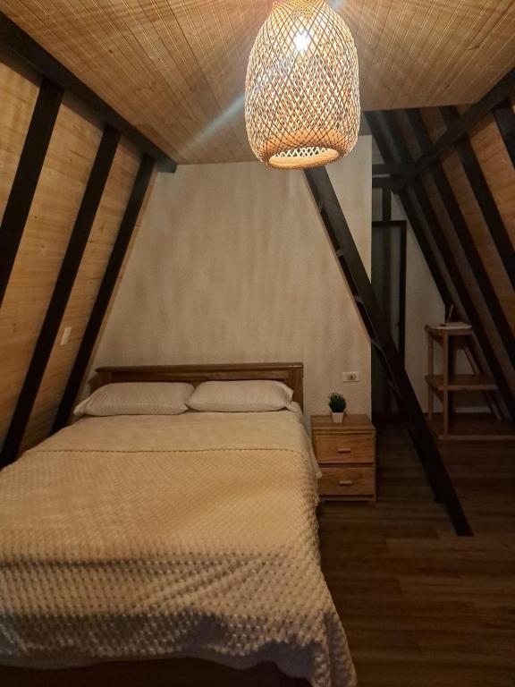 Postel nebo postele na pokoji v ubytování Cabañas el condor del Ruíz