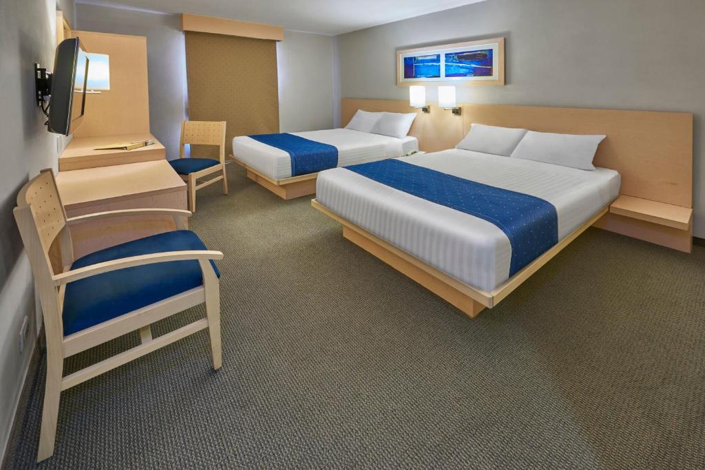 Cama o camas de una habitación en City Express by Marriott Puebla FINSA