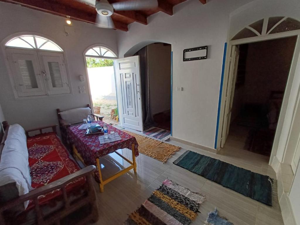 Postel nebo postele na pokoji v ubytování Nile Flower Guest House