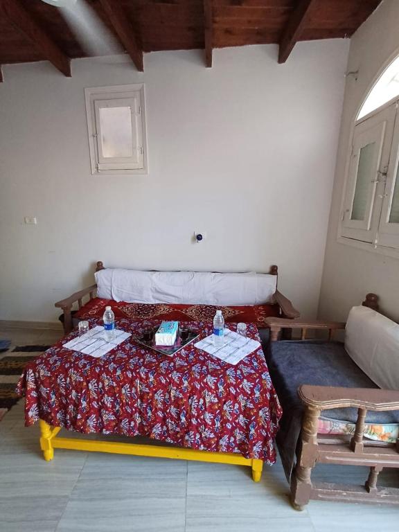 Postel nebo postele na pokoji v ubytování Nile Flower Guest House