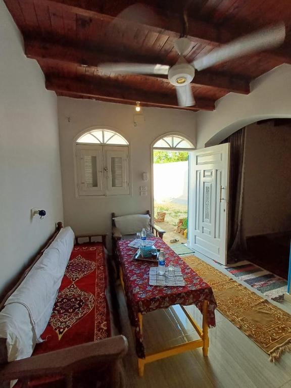 Postel nebo postele na pokoji v ubytování Nile Flower Guest House