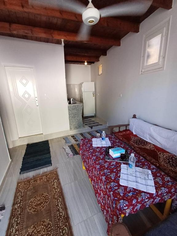 Postel nebo postele na pokoji v ubytování Nile Flower Guest House