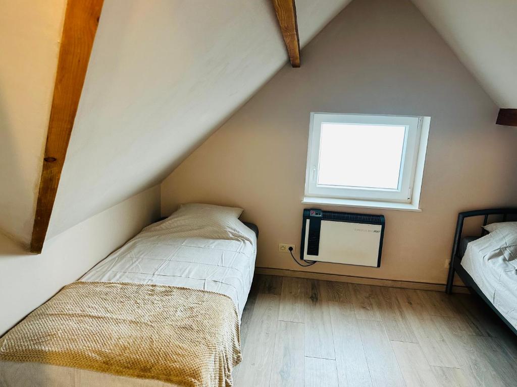 Postel nebo postele na pokoji v ubytování Sweet Home