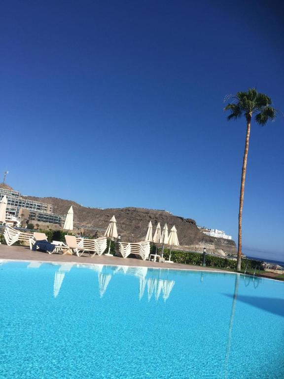 The swimming pool at or close to MOGAN PEARL - POOL - DOUBLE TERRACE - OCEAN VIEW - BEACH - WIFI - WONDERFUL Complex - FREE DIGITAL TRAVEL GUIDE