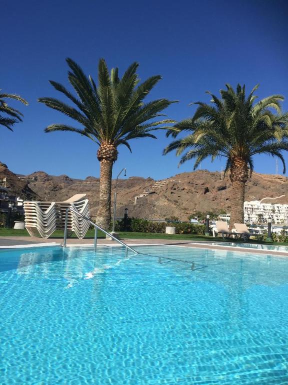 The swimming pool at or close to MOGAN PEARL - POOL - DOUBLE TERRACE - OCEAN VIEW - BEACH - WIFI - WONDERFUL Complex - FREE DIGITAL TRAVEL GUIDE