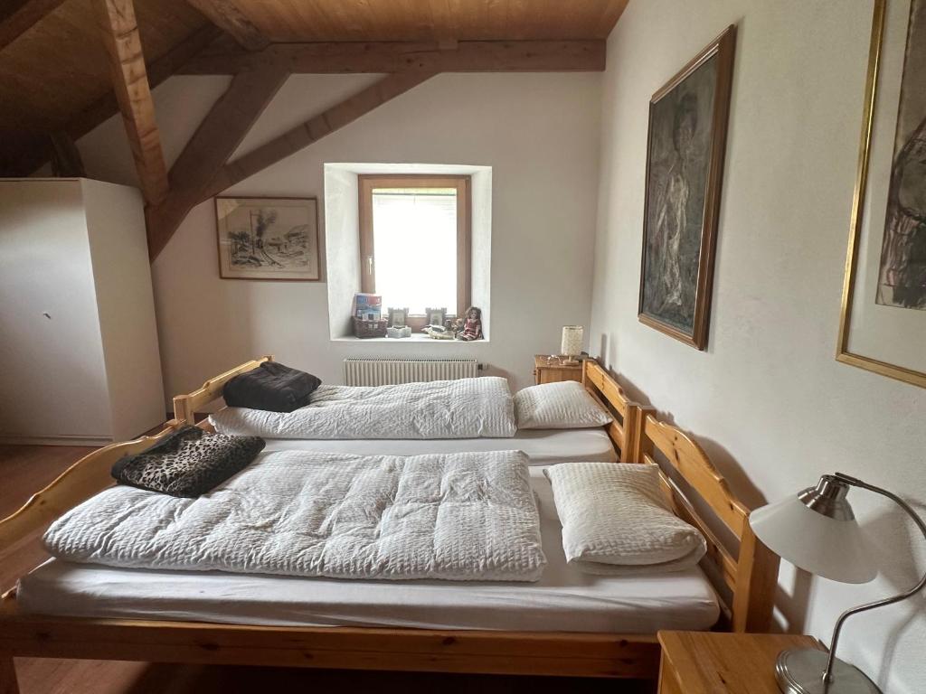 Postel nebo postele na pokoji v ubytování Gasthaus Schöntal