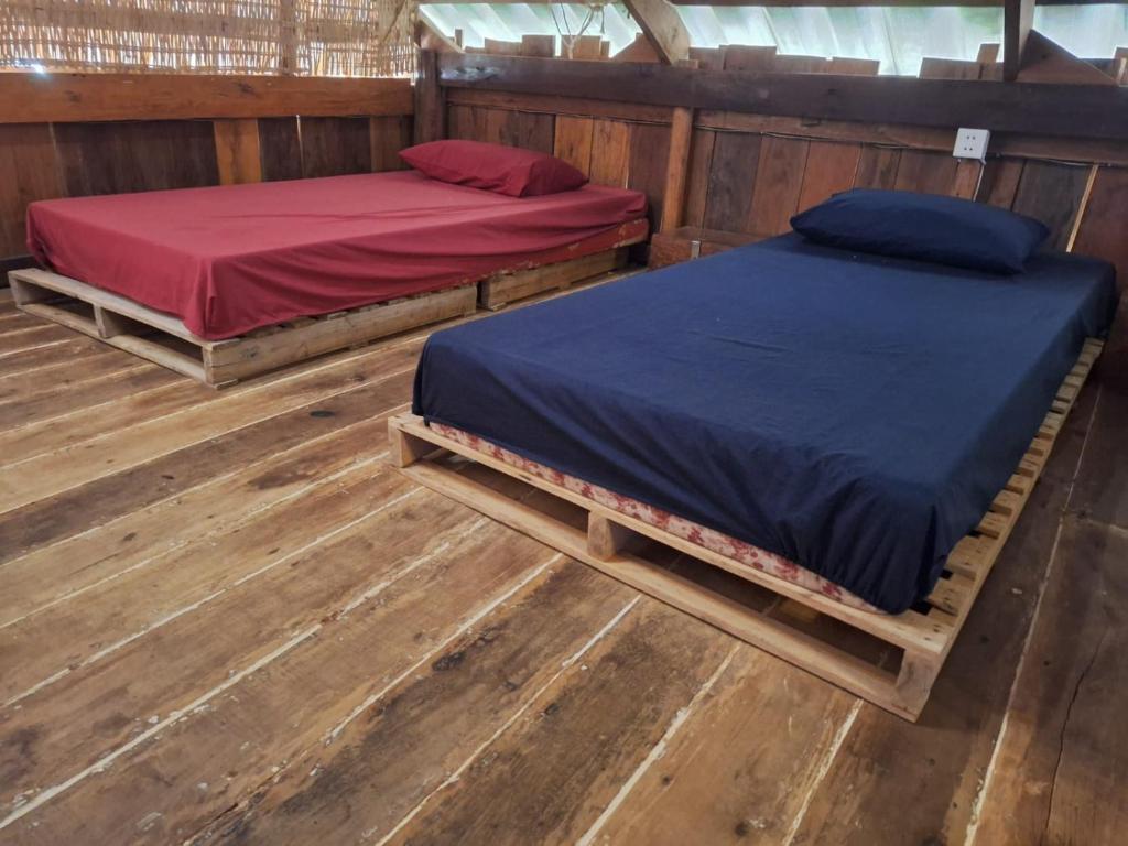 Postel nebo postele na pokoji v ubytování Dragonfly Guesthouse M'Pai Bay