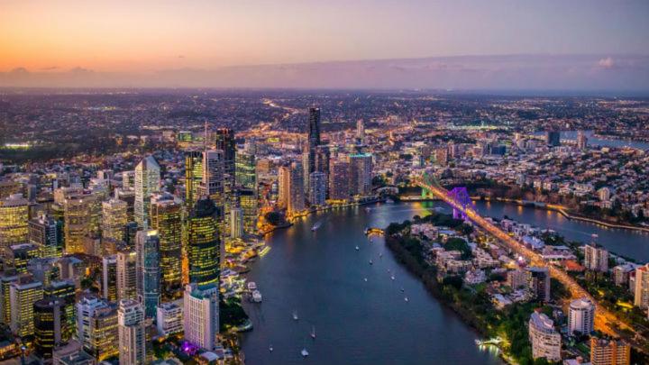 an aerial view of a large city with a river at Modern APT in Toowong with Mountain View in Brisbane