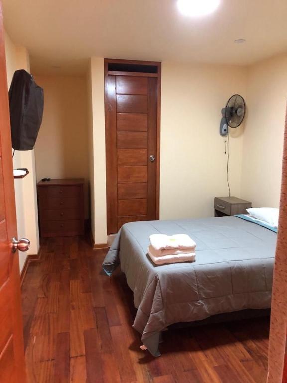 Postel nebo postele na pokoji v ubytování Casa Huéspedes Pimentel