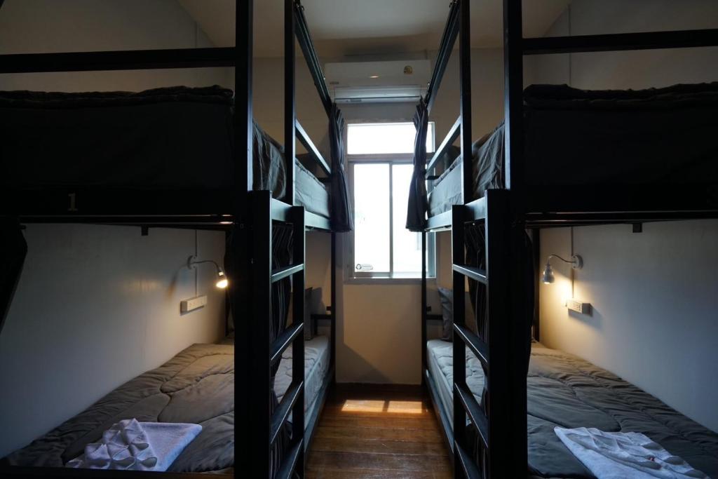 Postel nebo postele na pokoji v ubytování Amahostel