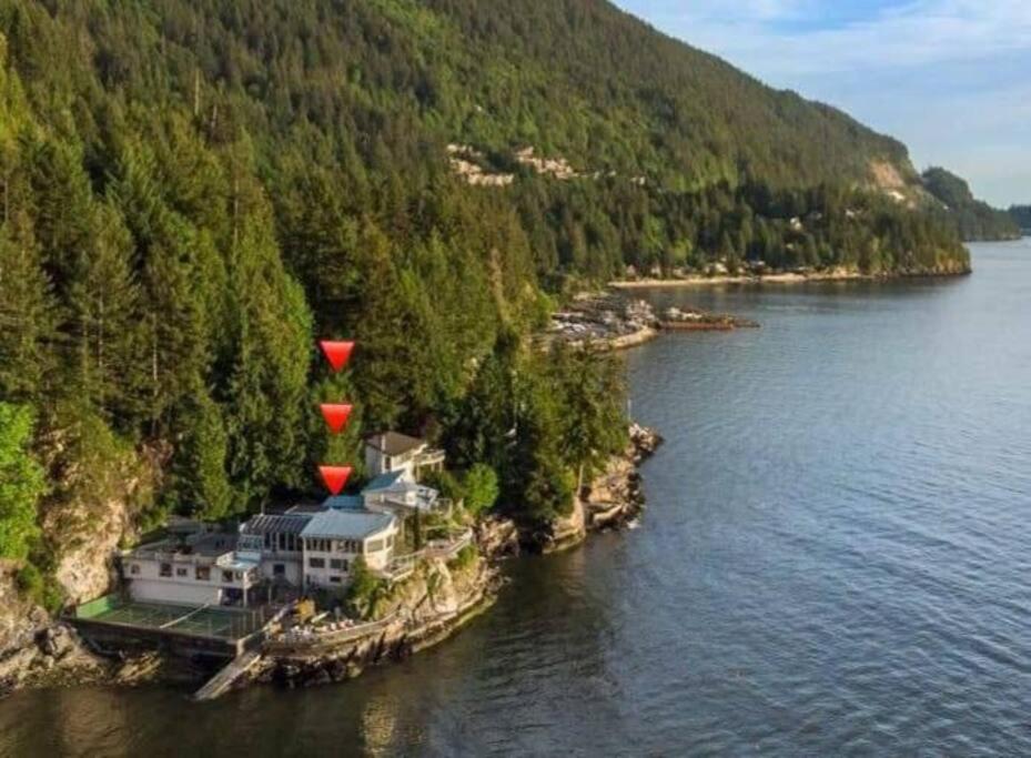 an aerial view of a house on a island in the water at Dream House -Water Lily in Horseshoe Bay