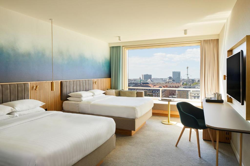 Postel nebo postele na pokoji v ubytování Copenhagen Marriott Hotel