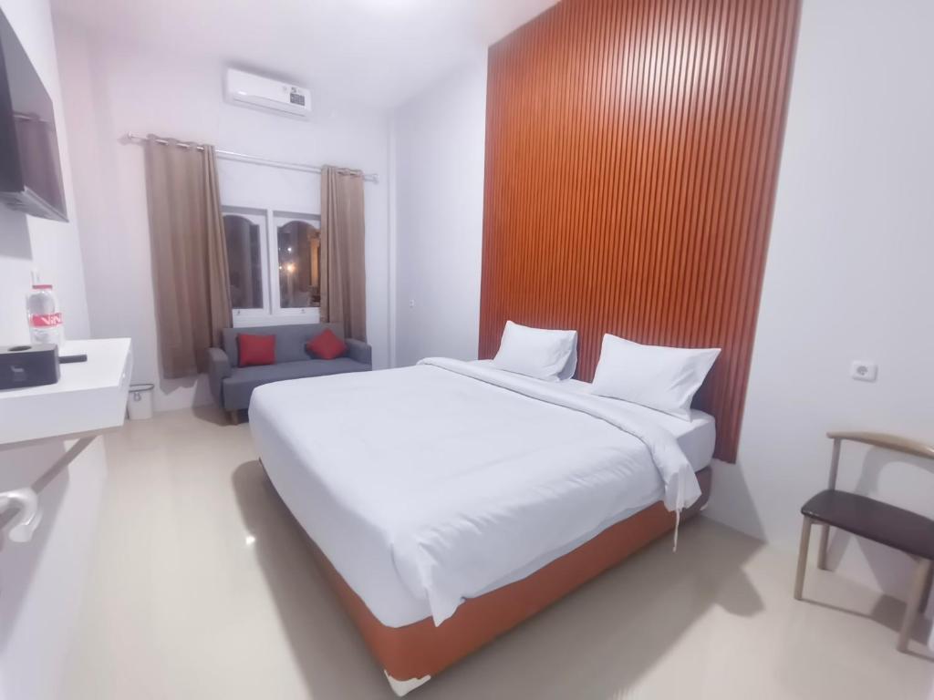 Postel nebo postele na pokoji v ubytování D'Rey Hotel