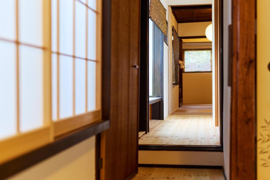 Postel nebo postele na pokoji v ubytování Japanese Modern Inn Kamakura Rakuan Hanare---3min walk from Hase Station