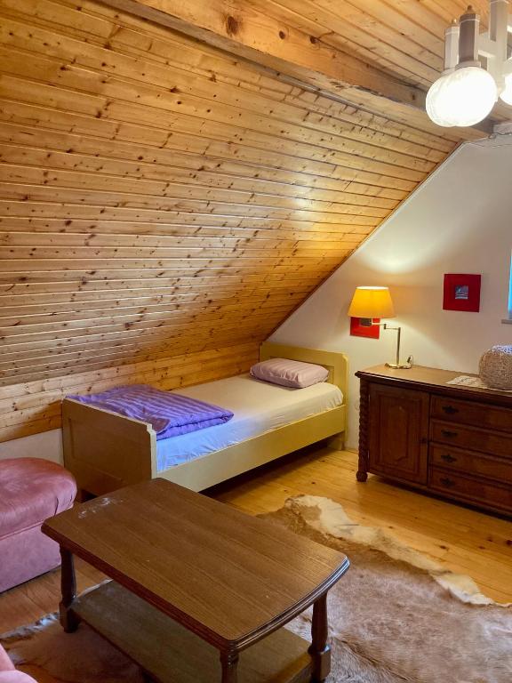 Postel nebo postele na pokoji v ubytování Papa Franks House