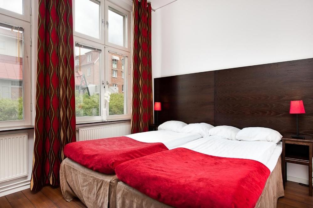 Postel nebo postele na pokoji v ubytování Hotel Jämteborg