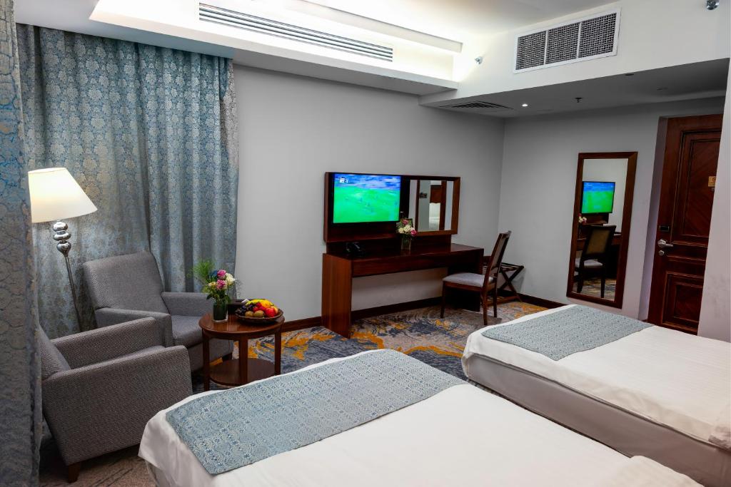 TV a/nebo společenská místnost v ubytování Ruve Jeddah Hotel