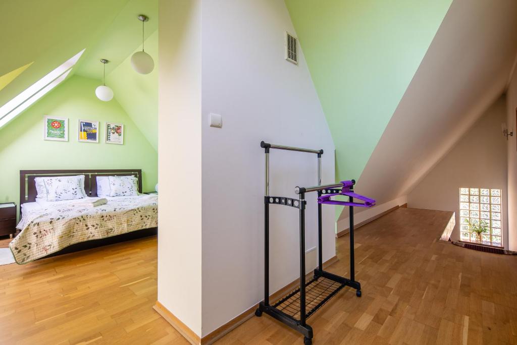 Postel nebo postele na pokoji v ubytování Apartamenty za Strugiem Zakopane