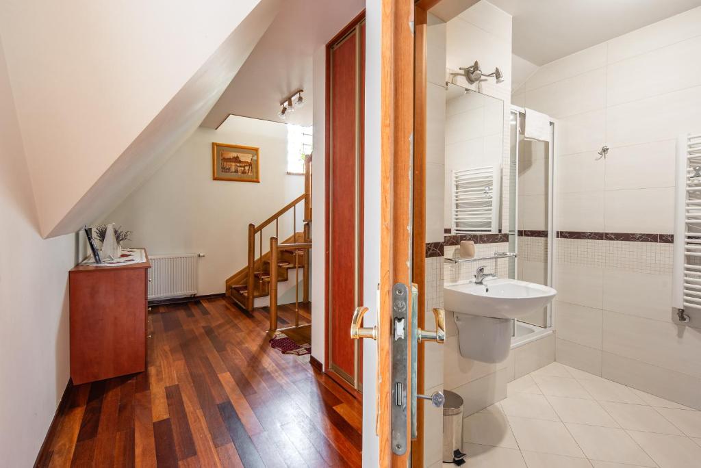 Koupelna v ubytování Apartamenty za Strugiem Zakopane
