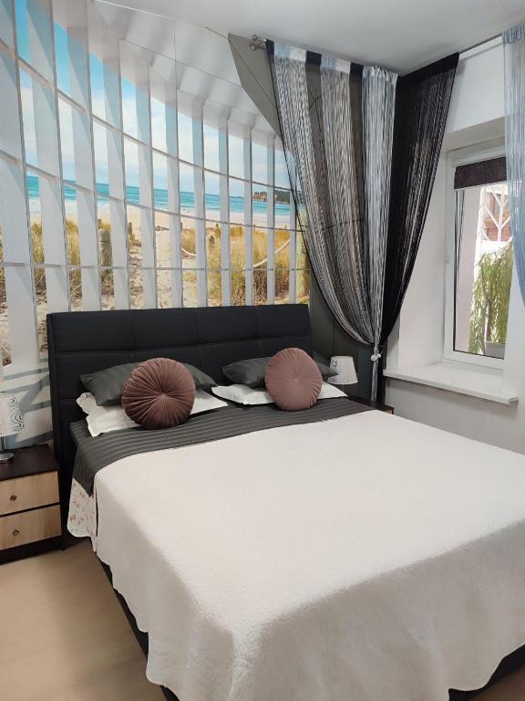 Posteľ alebo postele v izbe v ubytovaní London Apartment, Odessa