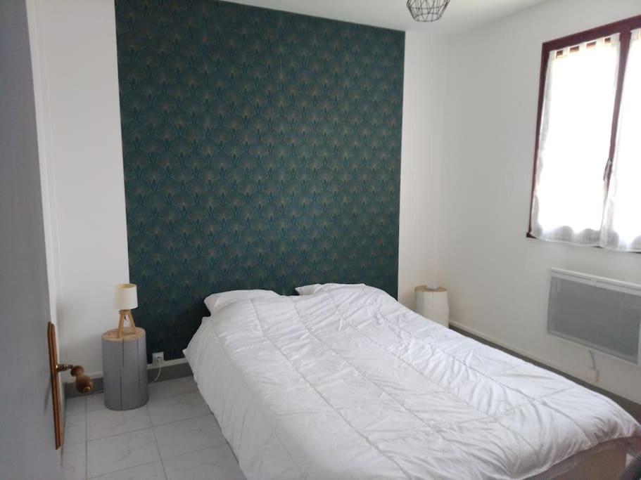 Postel nebo postele na pokoji v ubytování Gîte de la Chazotte