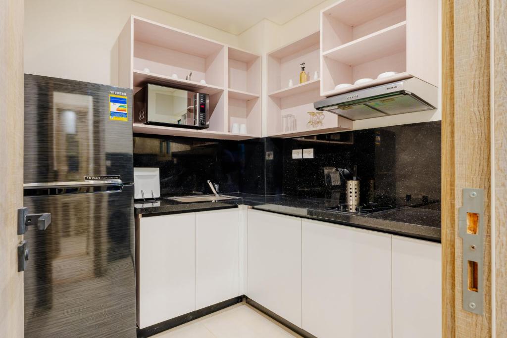 Kuchyň nebo kuchyňský kout v ubytování Brassbell l Zamalek l Chroma l Central Location