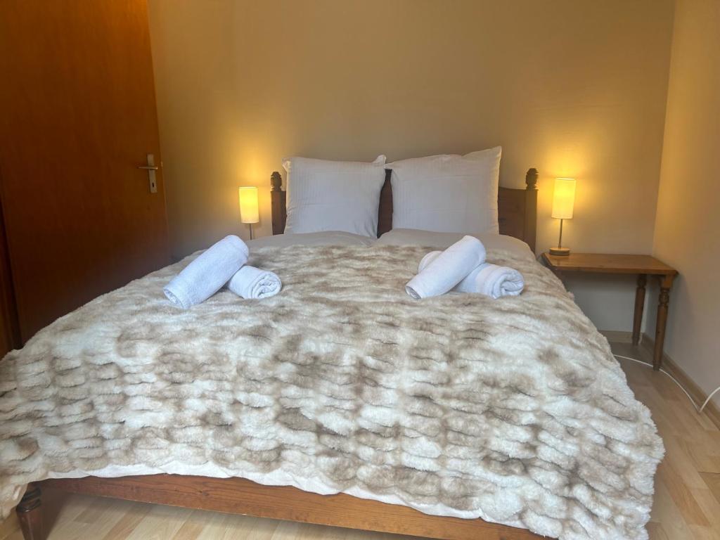 Postel nebo postele na pokoji v ubytování Chalet Bärli