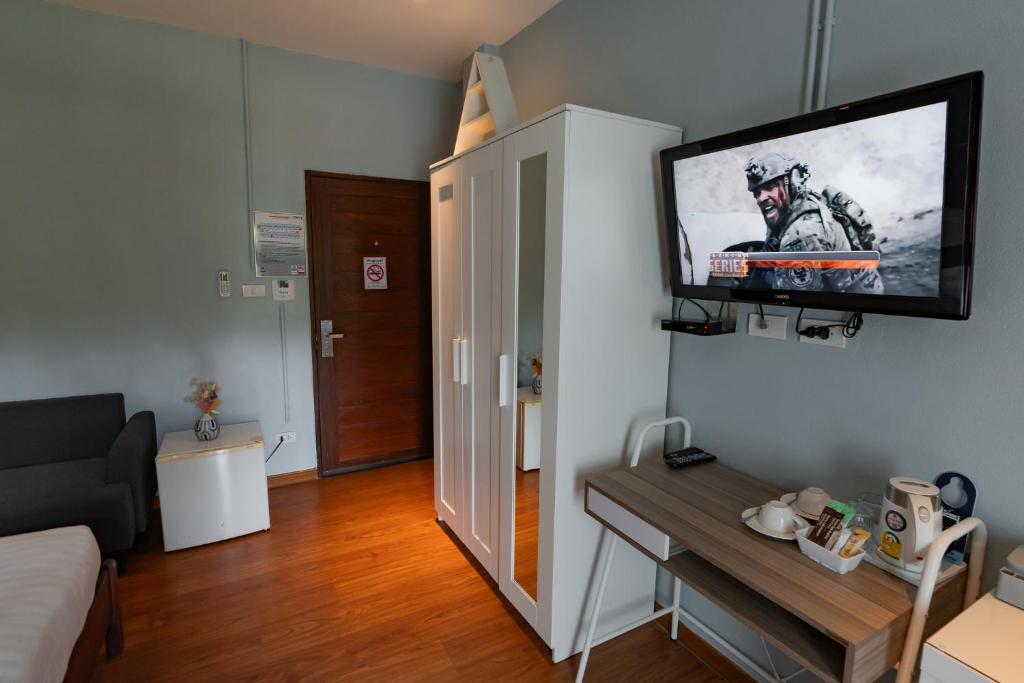 TV a/nebo společenská místnost v ubytování A Hotel Cozy