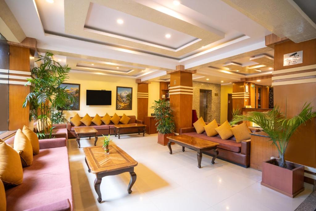 TV a/nebo společenská místnost v ubytování Devo Boutique Hotel
