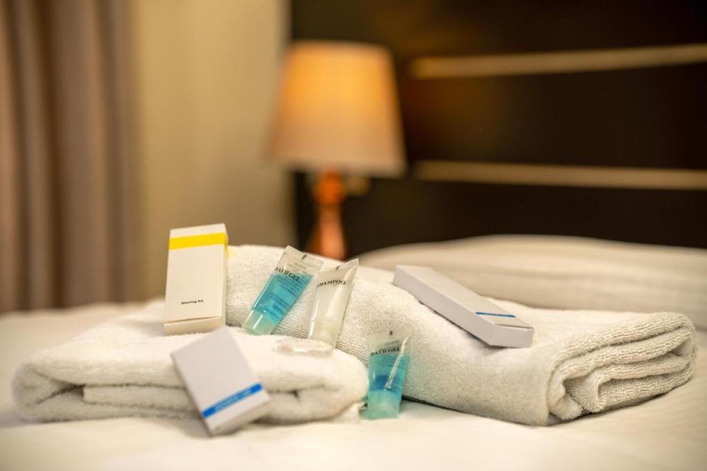 Postel nebo postele na pokoji v ubytování Devo Boutique Hotel