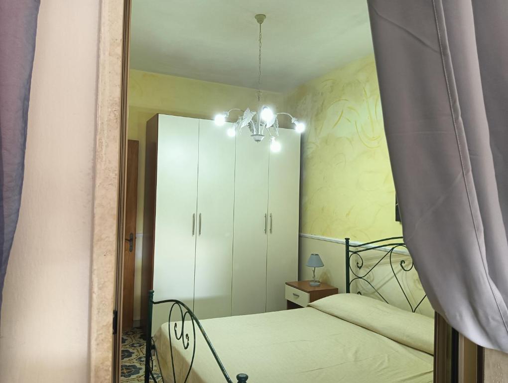 Postel nebo postele na pokoji v ubytování Gardenia