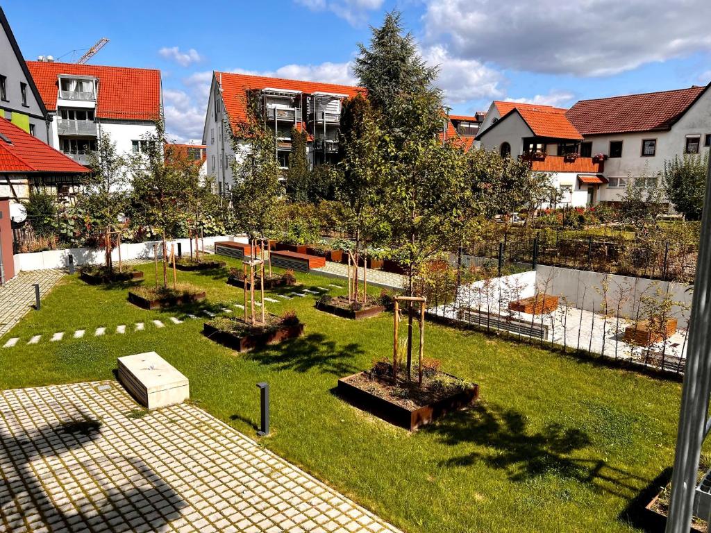 Zahrada ubytování Özels Designer Loft Metzingen - Smart TV, Netflix, private kostenlose Tiefgarage, Self-Express Check-in,Check-out, Outlet 100m
