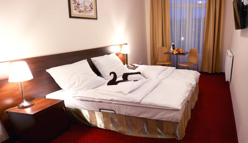 Posteľ alebo postele v izbe v ubytovaní St Lukas Medical & SPA