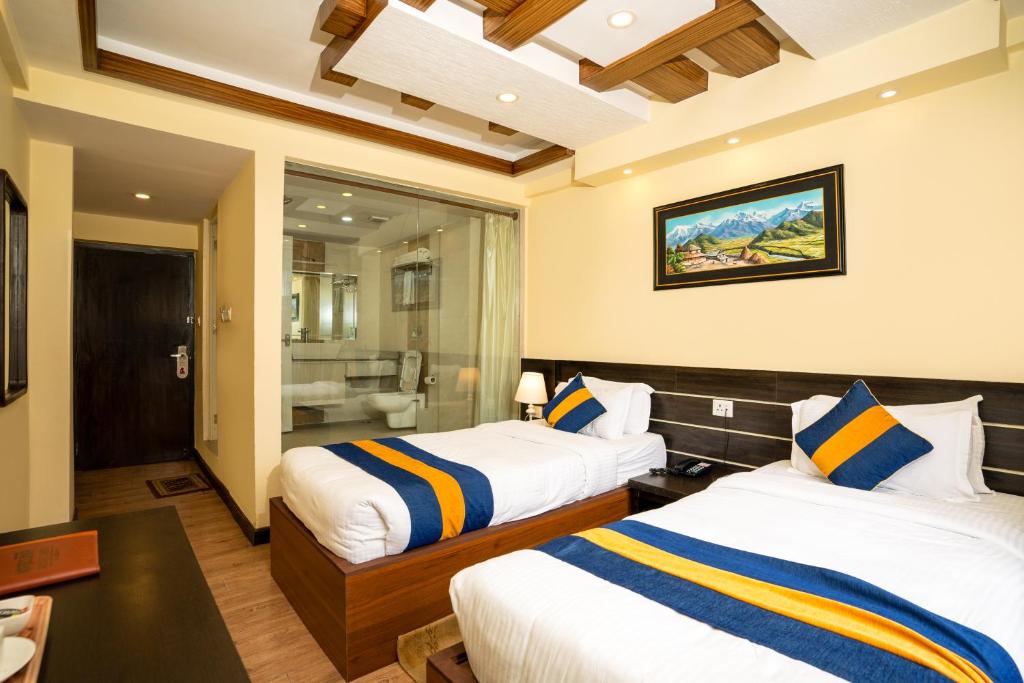 Postel nebo postele na pokoji v ubytování Devo Boutique Hotel
