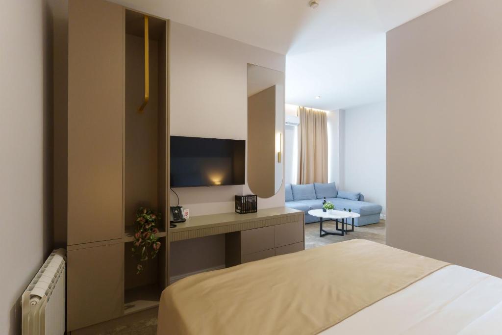 Postel nebo postele na pokoji v ubytování Move In Apartments
