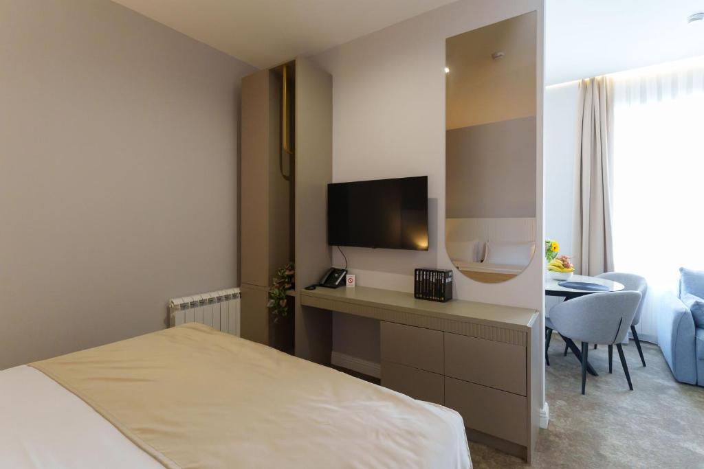 TV a/nebo společenská místnost v ubytování Move In Apartments