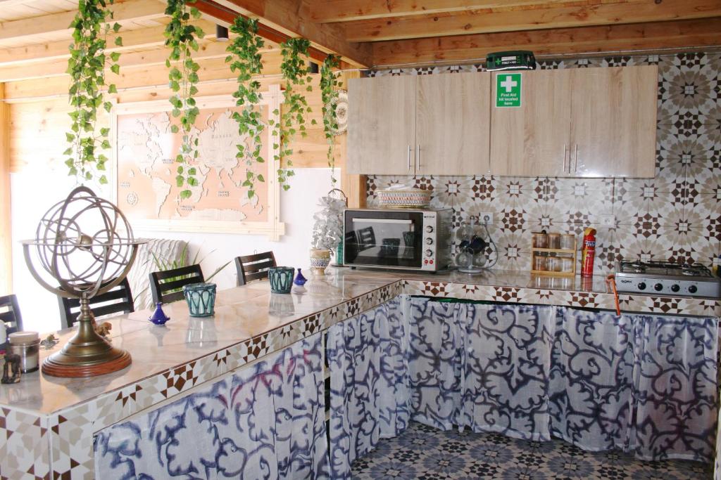 Kuchyň nebo kuchyňský kout v ubytování Aourir Waves Surf House
