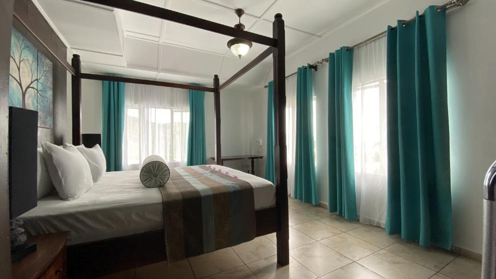 Postel nebo postele na pokoji v ubytování Stephna Residence