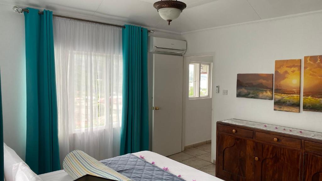 Postel nebo postele na pokoji v ubytování Stephna Residence