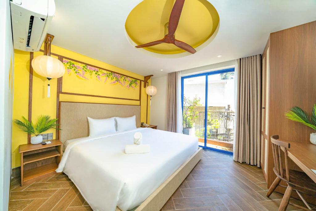Giường trong phòng chung tại Sujet Hotel Da Nang